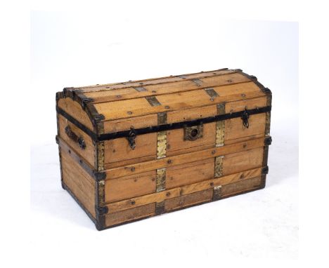 A VICTORIAN DOME TOPPED IRON BOUND TRUNK with striped paper lined interior, 91cm wide x 51cm deep x 57cm high