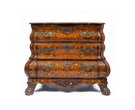 A 18TH CENTURY WALNUT AND MARQUETRY DECORATED BOMBE COMMODE with serpentine top, ormolu handles and escutcheons, and standing