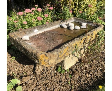 A LIME STONE SHALLOW TROUGH, 96.5cm wide x 51cm deep x 13cm high