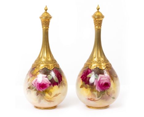 A PAIR OF WORCESTER GLOBULAR VASES AND COVERS with narrow necks decorated with roses by Sedgley, with puce marks beneath and 
