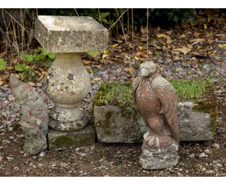 A SMALL CARVED STONE RECTANGULAR TROUGH 48cm x 39cm x 15cm together with a carved stone bird bath, 50cm high; a garden gnome 