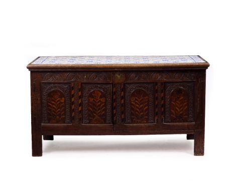 AN ANTIQUE OAK CUPBOARD converted from 17th Century and later parts with blue and white tile inset top, marquetry inlaid arca