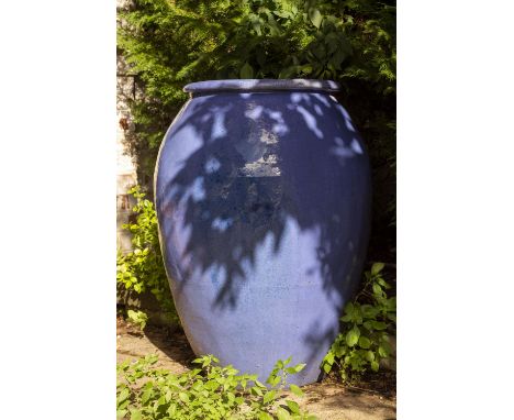 A LIGHT BLUE GLAZE OVOID JAR OR GARDEN PLANTER approximately 58cm diameter x 86cm high