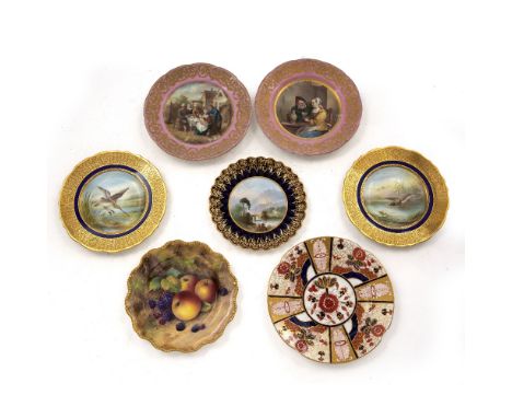 A PAIR OF CAULDON LIMITED CABINET PLATES decorated by S Pope with a 'Wild Duck' and a 'Snape', 22.5cm diameter; together with