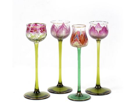 A PAIR OF 19TH CENTURY CONTINENTAL APERITIF GLASSES with enamel decoration, together with two further similar glasses, all 15