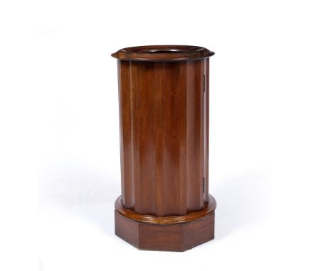 A VICTORIAN MAHOGANY BASIN STAND OR POT CUPBOARD of fluted column form with ring turned top and octagonal plinth base, 40cm d