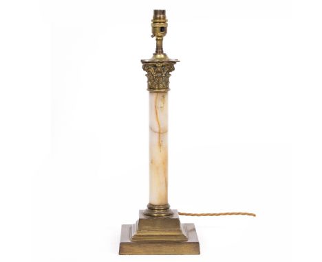 A BRASS AND ONYX TABLE LAMP of Corinthian column form with cast capital and stepped base, 15cm wide x 46cm high