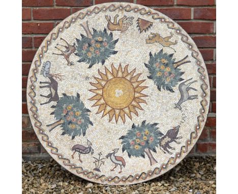 A CIRCULAR GARDEN TABLE TOP with mosaic inlay depicting exotic animals beneath flowering trees around a central sun and all w