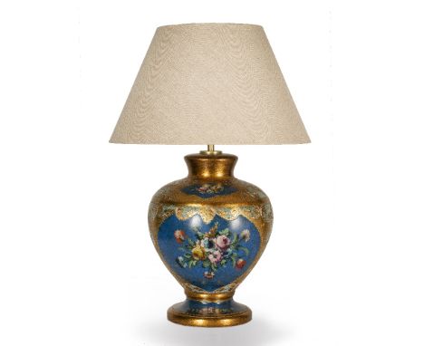 A GILDED AND BLUE GROUND PLASTER LAMP of baluster vase form, with flower decoration, 68cm in height including the shade