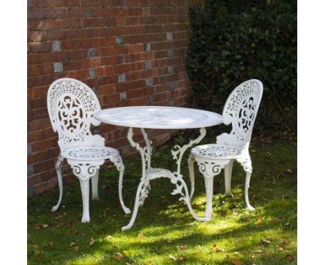 A WHITE PAINTED GARDEN TABLE80cm diameter with a pair of white painted garden chairs, 86cm high