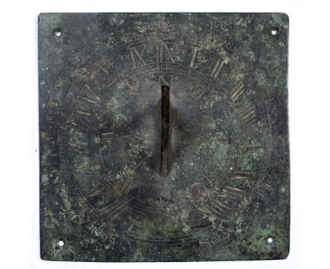 AN OLD BRONZE SUN DIAL PLATE with pierced nomad engraved with roman numerals and motto 'The Evening Hour is Nigh Seize the Pr