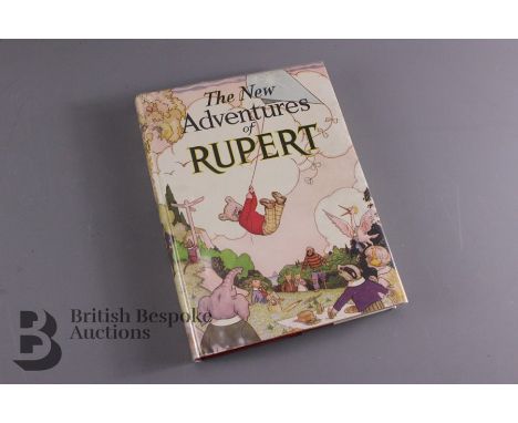 Rupert Annual 1936, fine example in original dust wrapper. The dust wrapper is a little fragile at flap hinges. This book bel