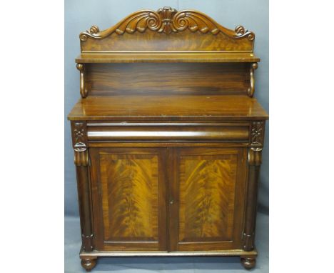 VICTORIAN MAHOGANY CHIFFONIER with carved detail to the top rail and shelf supports on a single drawer, two door cupboard bas