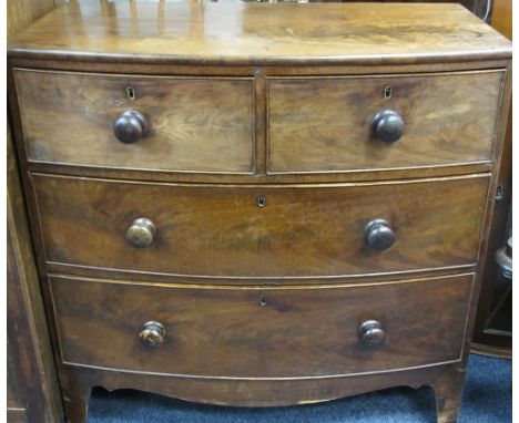 VICTORIAN MAHOGANY BOW FRONT CHEST of two short over two long drawers with turned wooden knobs on corner bracket feet, 89cms 