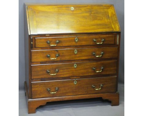 GEORGIAN MAHOGANY FALL-FRONT BUREAU, the sloped fall opening to reveal interior drawers and pigeon holes over four long oak l