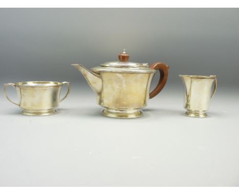 STYLISH THREE PIECE TEA SERVICE, Birmingham 1966/69, maker Deakin &amp; Francis Ltd, plain circular form with Bakelite knop a