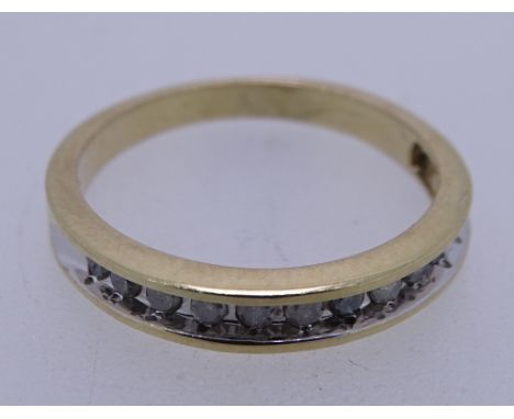 10CT GOLD &amp; DIAMOND SET HALF ETERNITY RING, size Mid M-N, stamped 10K and 1/4 TW, having eleven stones within a silvered 