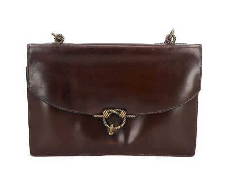HERMÈS VINTAGE Handtasche "KNOT LOCK". Glattleder in Dunkelbraun mit goldfarbener Hardware. Überschlag mit dekorativem Schlus
