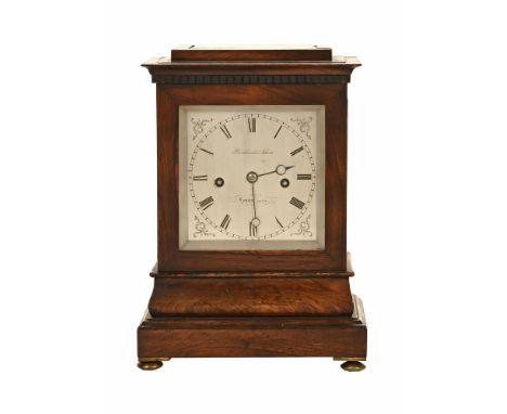 An early Victorian rosewood framed mantel clock, of small size having a silvered dial inscribed Brockbank & Atkins, the plain