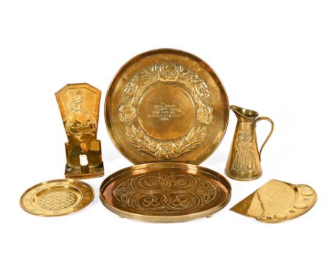 A collection of late 19th century Arts & Crafts style brass items, comprising a hot water jug by J Sankey & Sons with impress
