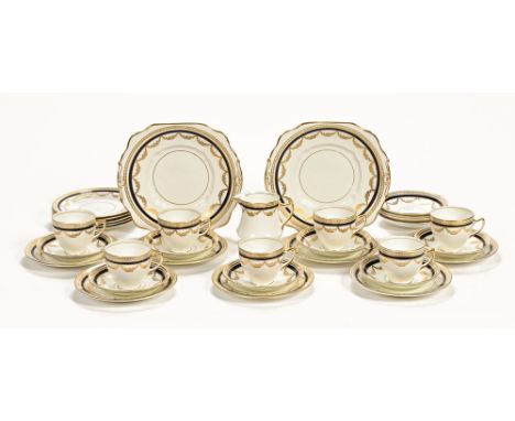 An Edwardian Diamond China Limited part tea service, 7 cups, 12 saucers, 12 side plates, 2 sandwich plates and cream jug.