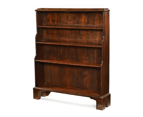 A 19th century mahogany waterfall bookcase, with shallow gallery to the top shelf and all raised on tall bracket feet.  Heigh