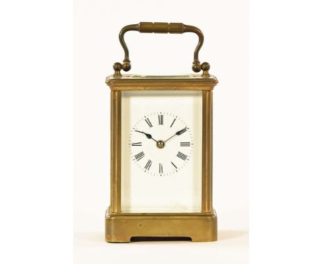 An Edwardian brass carriage clock, timepiece only.  Height 12.3 cm.