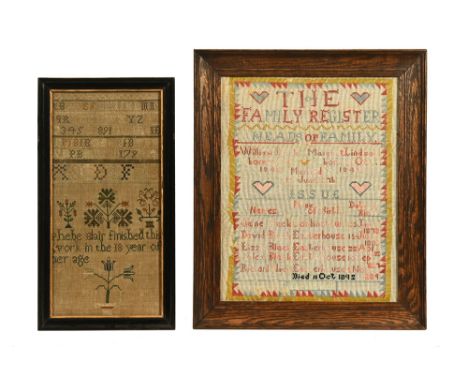 A 19th century cross stitch sampler, inscribed Phebe Blair finished this work in the 18 year of her age with bands of alphabe