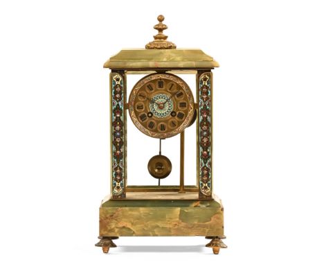 A 19th century French onyx and champleve enamel mantel clock, with ormolu style finial over blue enamel supports containing a