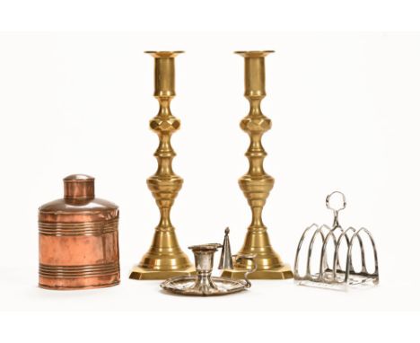 A miniature Sheffield plated chamber stick with snuffer, together with a copper tea caddy, a plated toast rack and a pair of 