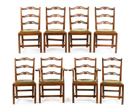 A set of eight mahogany ladder back dining chairs, with faux green leather drop in seats, six singles and two carvers.   COND