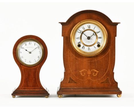 An Edwardian inlaid mahogany balloon clock by Mappin & Webb, timepiece only together with another mantel clock with two train