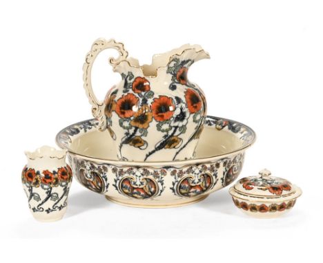 An Edwardian ceramic wash set, makers mark Gurton K & C.E. to the base, comprising jug, basin, soap dish with lid and vase, a