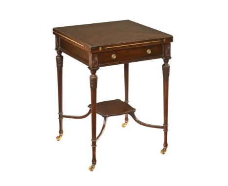 An Edwardian mahogany envelope card table, opening to a green baize lined interior with single drawer raised on fluted taperi