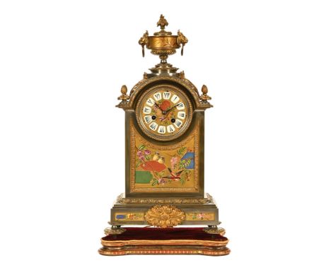 A 19th century Goldsmiths Company mantel clock, of French aesthetic design with silver plated and gilt bronzed frame (worn), 