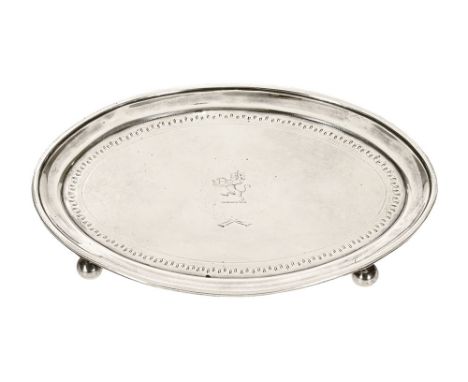A George III silver teapot stand, oval with lion to centre, maker Duncan Urquhart and Napthali Hart, London 1808.  Length 19.