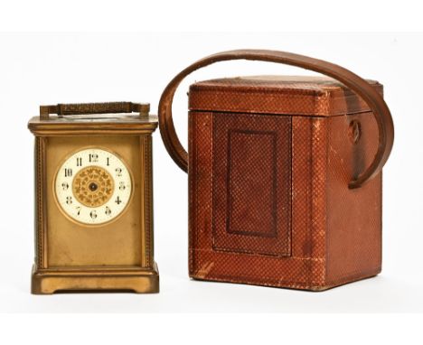 An early 20th century brass carriage clock.  Height excluding carrying handle 10.5 cm, cased.