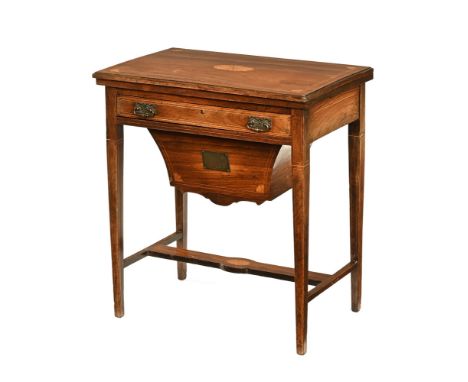 A late Victorian rosewood games/sewing table, having rectangular line and shell inlay swivel top to reveal inlaid games featu