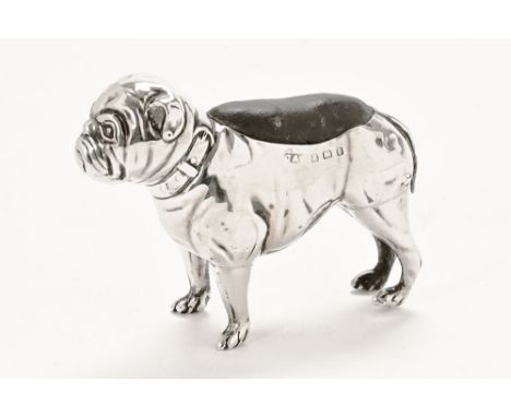 A silver Edwardian pincushion, modelled as a pug.  Length 7 cm.   CONDITION REPORT:  This Edwardian pin cushion is in used co