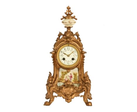 Medaille D'Argent of France, a gilt metal and porcelain mantel clock, with enamelled dial with floral decoration and porcelai