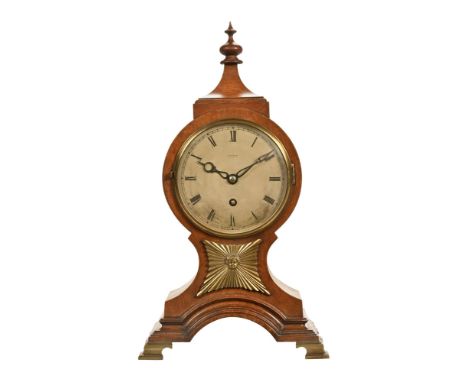 Edward of Glasgow a mahogany and brass cased mantel clock, with a central finial above a silvered dial with cherub and sunbur