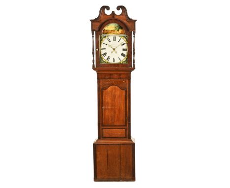 A late 18th century oak and mahogany longcase clock, with swan neck and pillar hood containing an arched painted dial of gun 