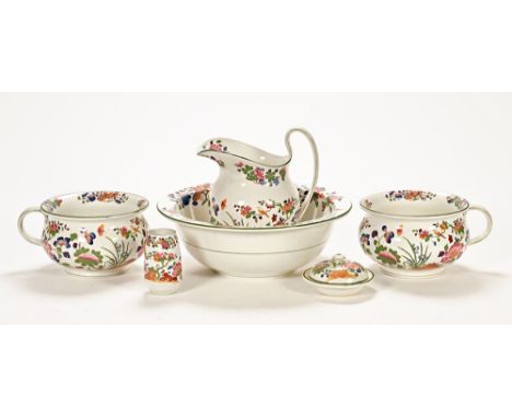 An Edwardian Wedgwood Etruria ceramic wash set, comprising two chamber pots, basin, jug, toothbrush holder and soap dish with