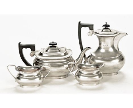 A four piece silver tea service, comprising teapot, hot water jug, sugar basin and cream jug, Sheffield hallmarks for 1962, 6