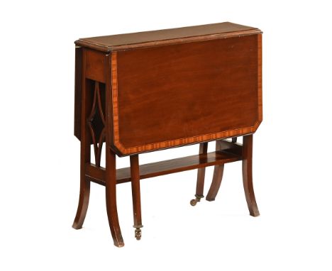 An Edwardian mahogany and satinwood crossbanded rectangular Sutherland style occasional table, with two drop flaps and centra