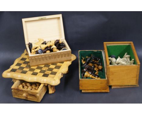 A twentieth century compact chess set together with three complete chess sets (no boards)