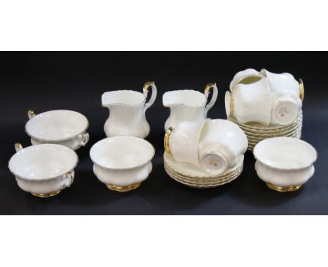 Royal Albert 'Val d'Or'; six teacups, twelve saucers, two milk jugs, two sugar bowls and six soup bowls