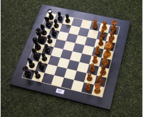 A large-scale chess set with a wooden chess board