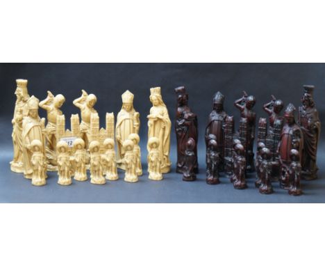 A large-scale well-cast resin chess set with a vinyl chess board