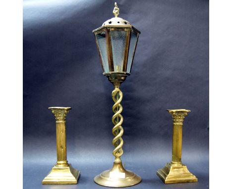 A pair of column form antique brass candlesticks plus a brass table lamp (not tested)